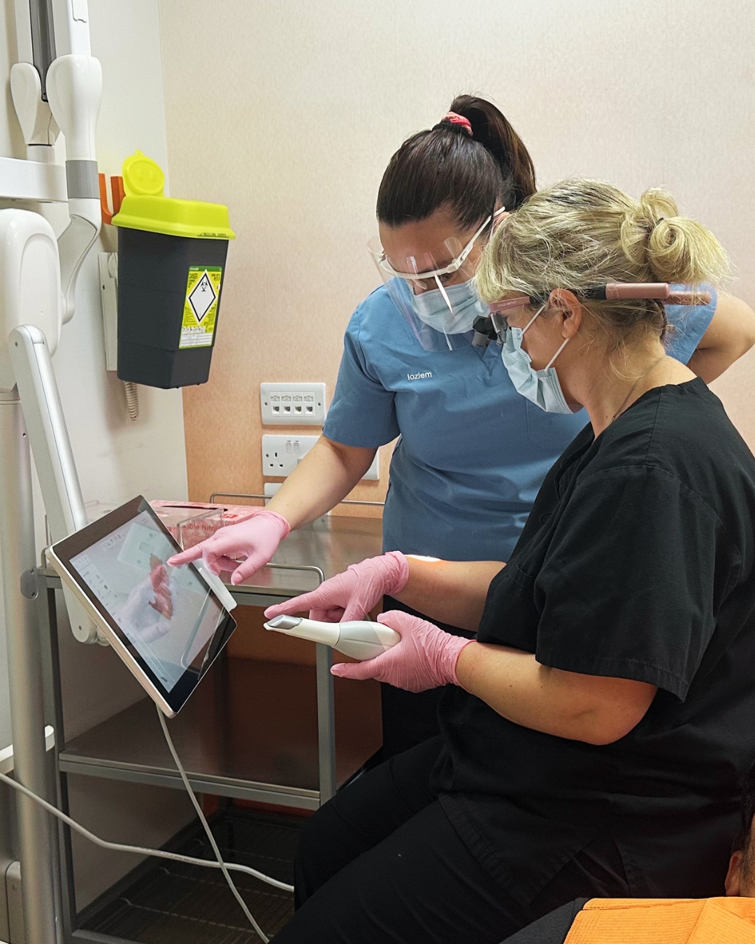 Dentist explaining treatment options to patient at Open Dental Care Islington