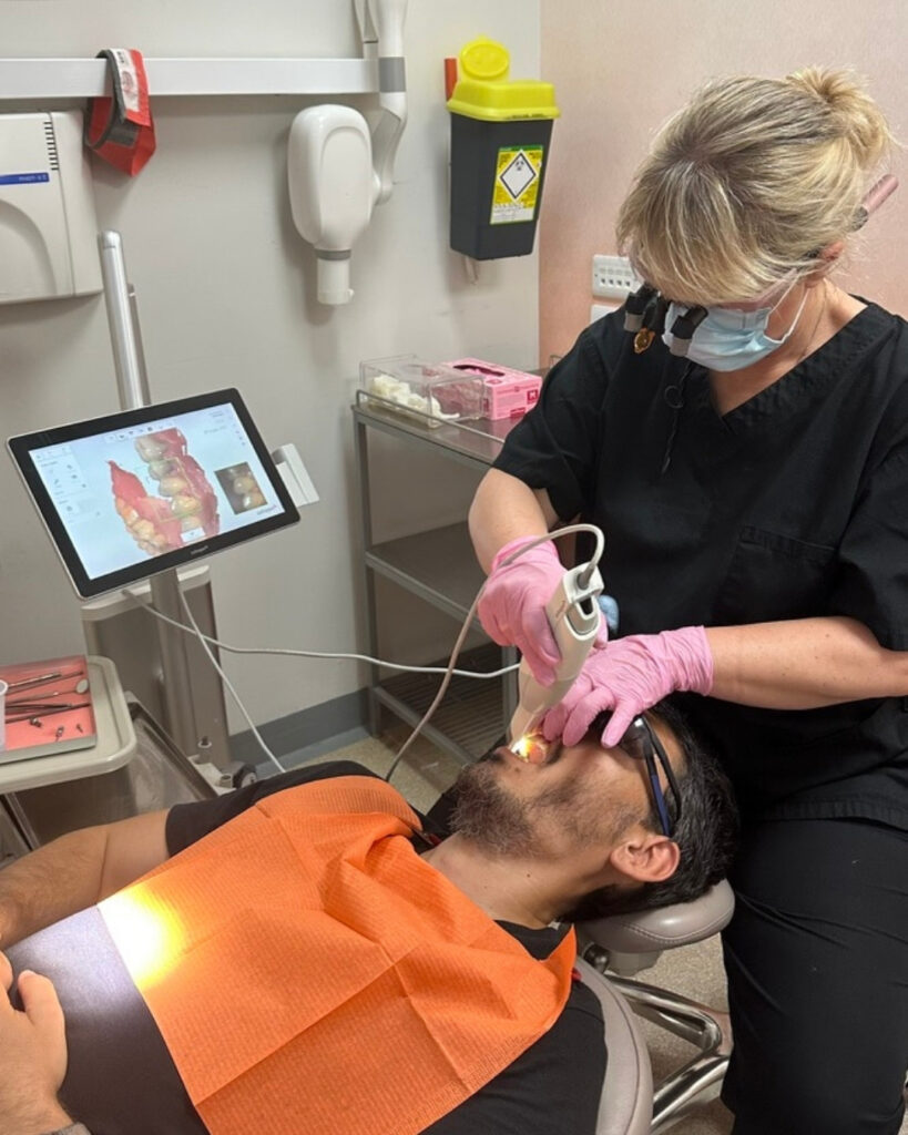 Dr Margarita operating a treatment